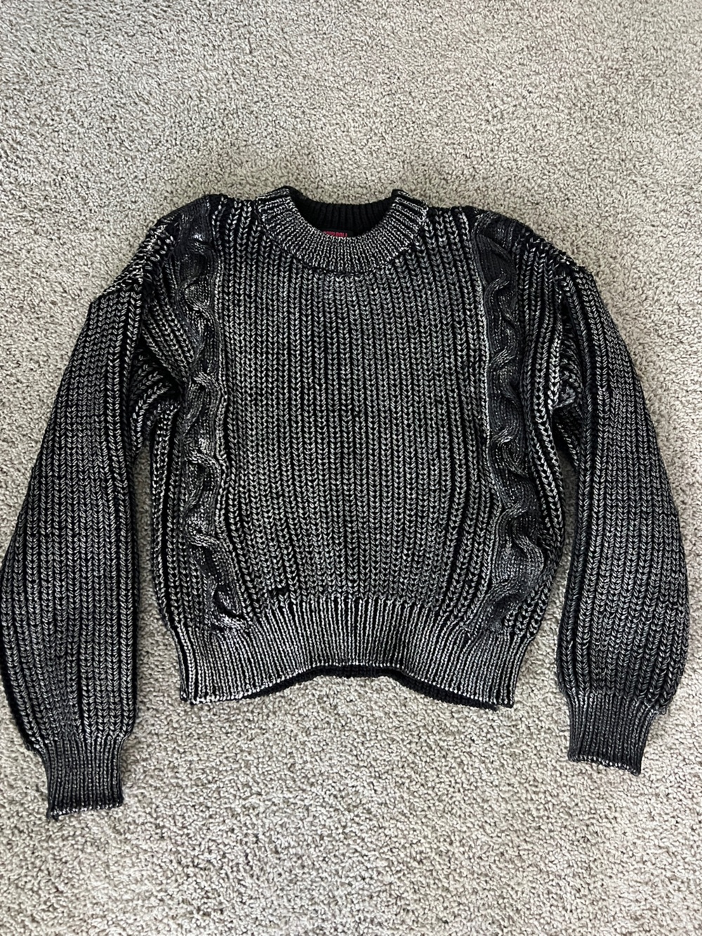 Black cable knit sweater with silver foil detailing. Crewneck Sweater